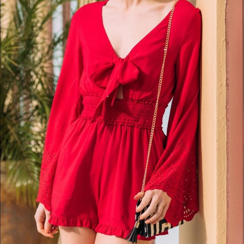 Red long sleeve romper size small Francescas